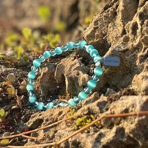 Hand made moon stone / seed bead & stainless steel.